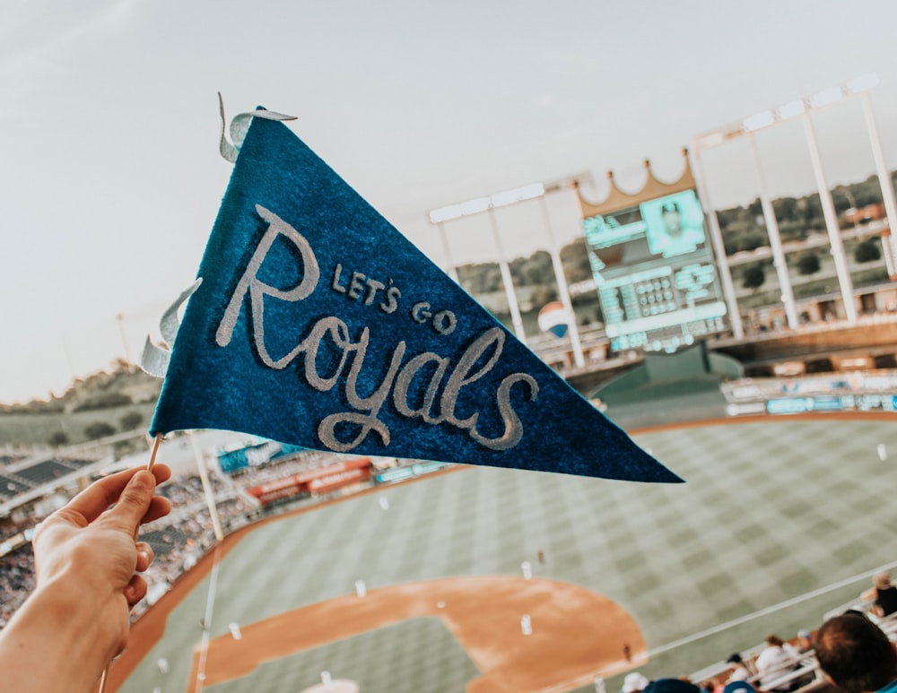 blue and white Lets Go Royal pennant