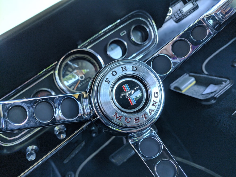 a close up of a steering wheel on a car