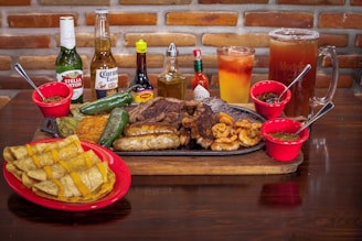 grilled food with bottles and beverages