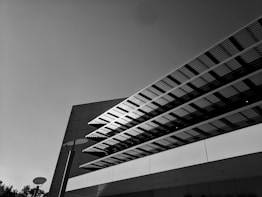 grayscale photo of concrete building