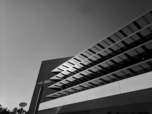 grayscale photo of concrete building