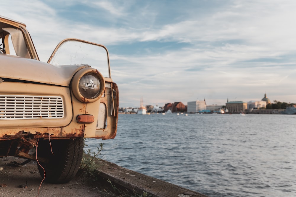 car parked beside body of water