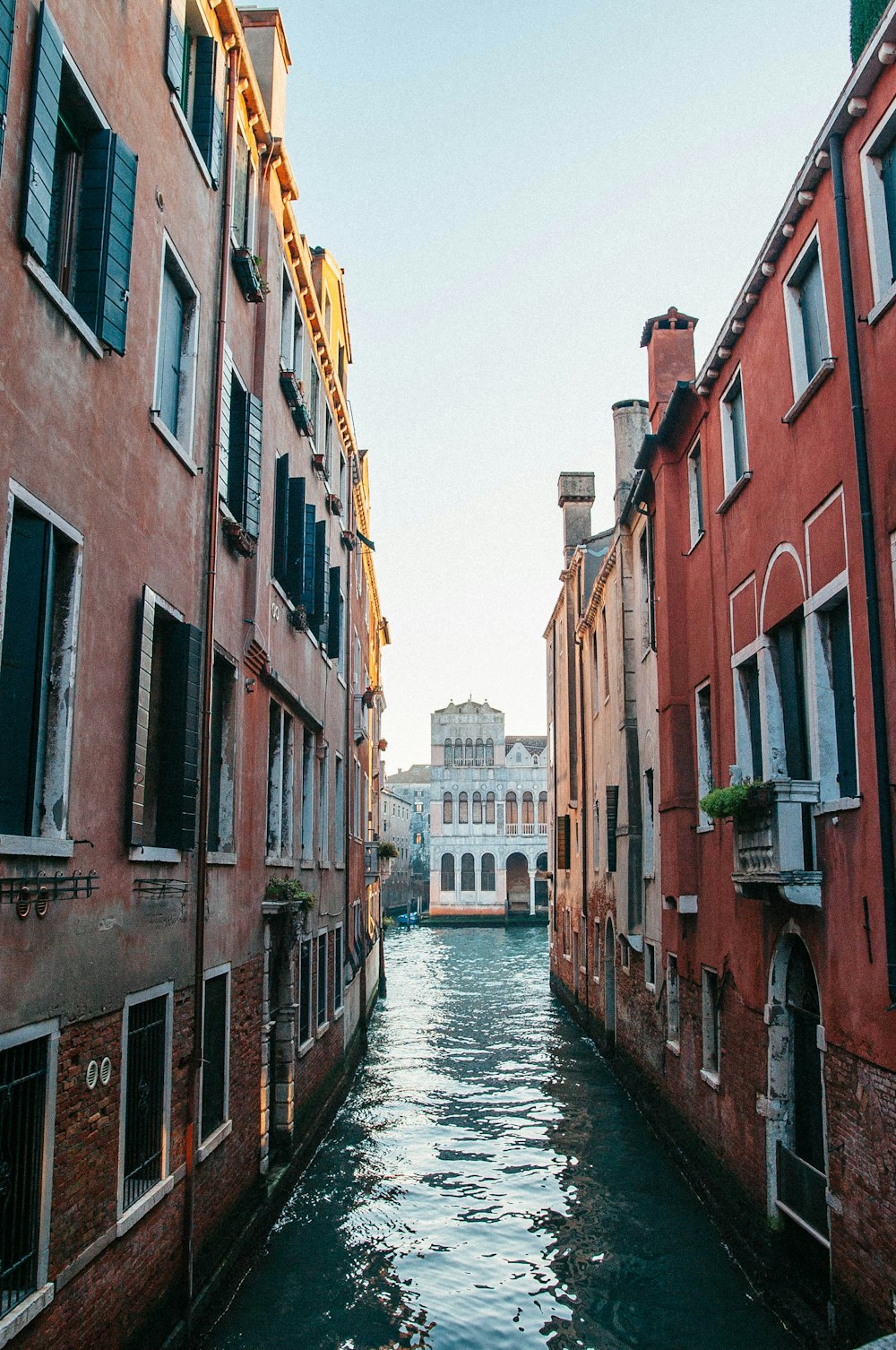 body of water between buildings