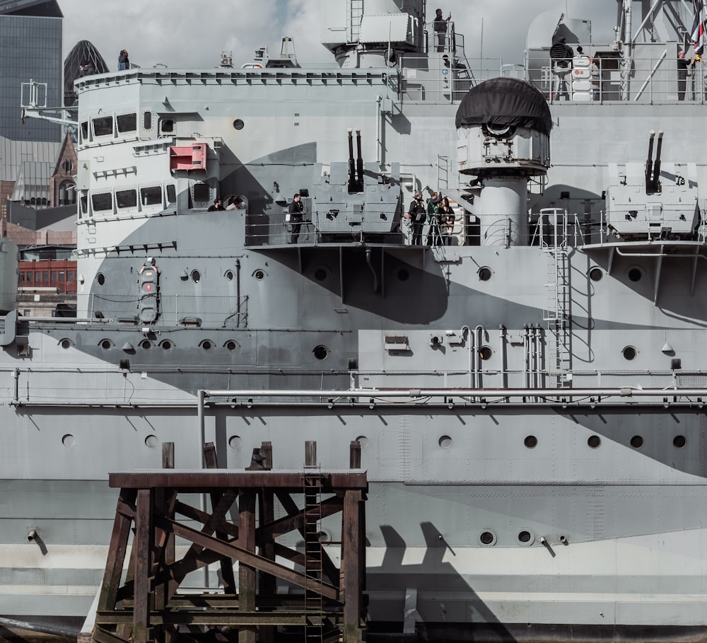 grey battleship in dock