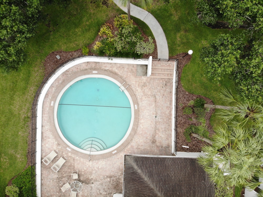 aerial view of house with round pool