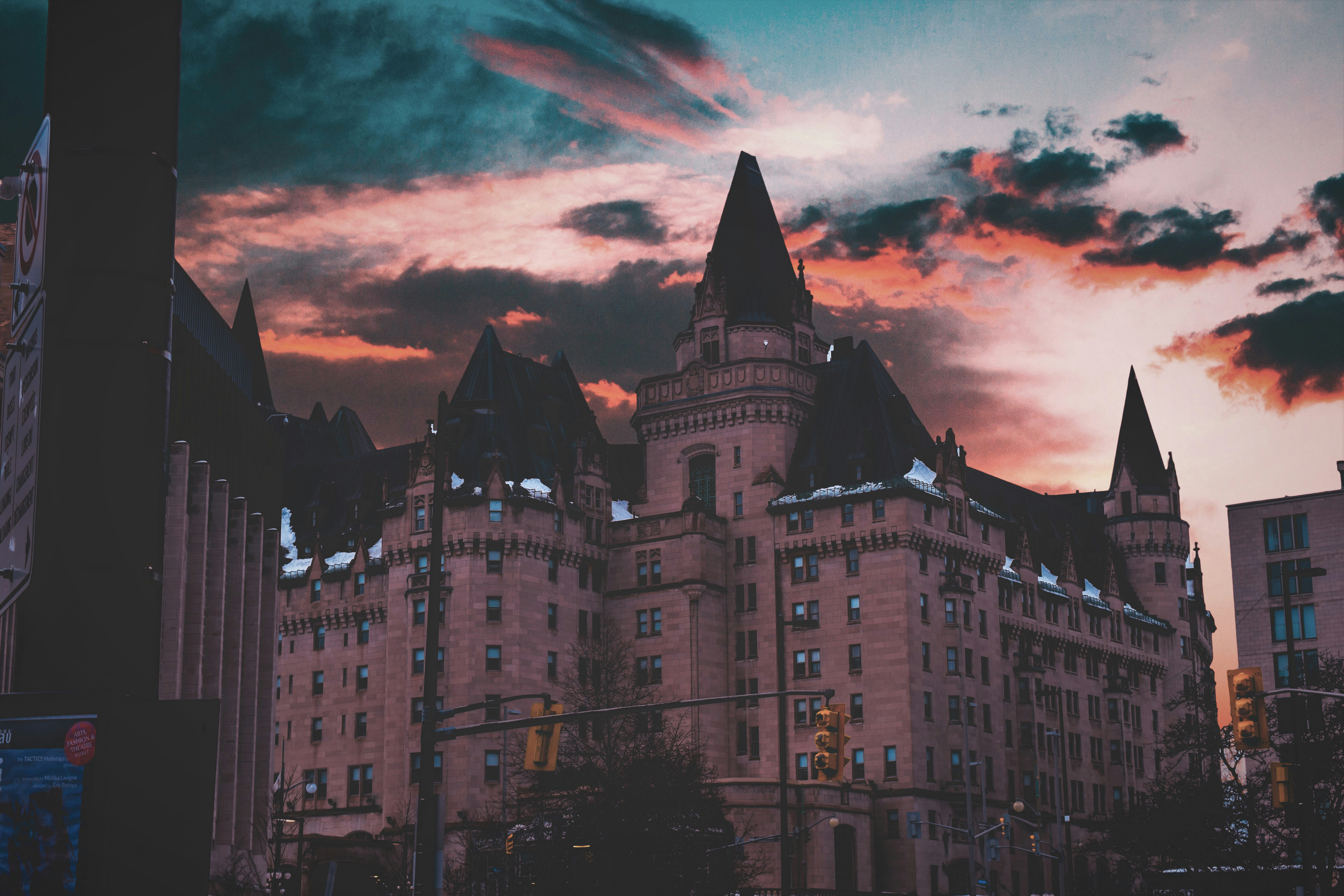 brown and gray castle under orange skies