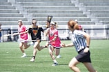 Colorful sports event with players in action on a sunny day.