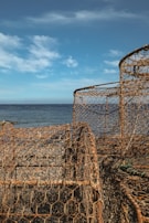 Rust-resistant iron mesh panels stacked ready for installation on a farm.