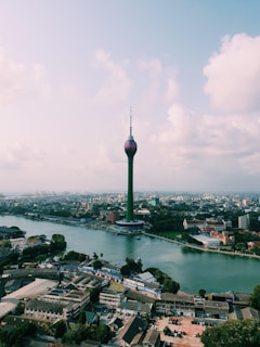 green tower in city