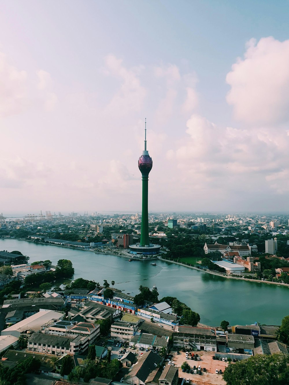 green tower in city