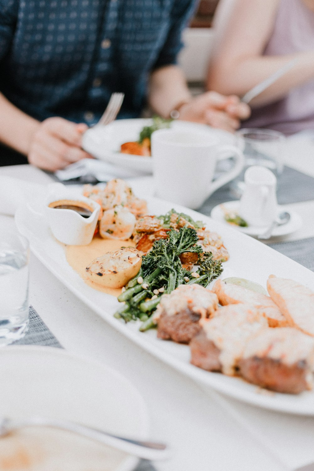 cooked meat served on white platter