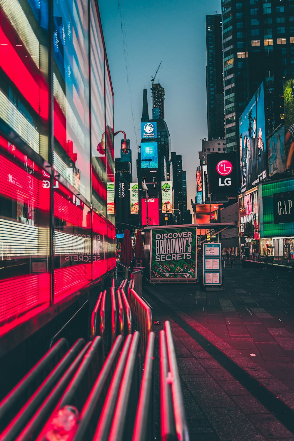 city buildings at night with different colors