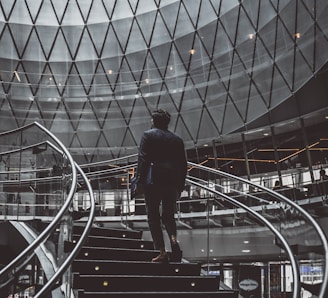 man standing on stairs