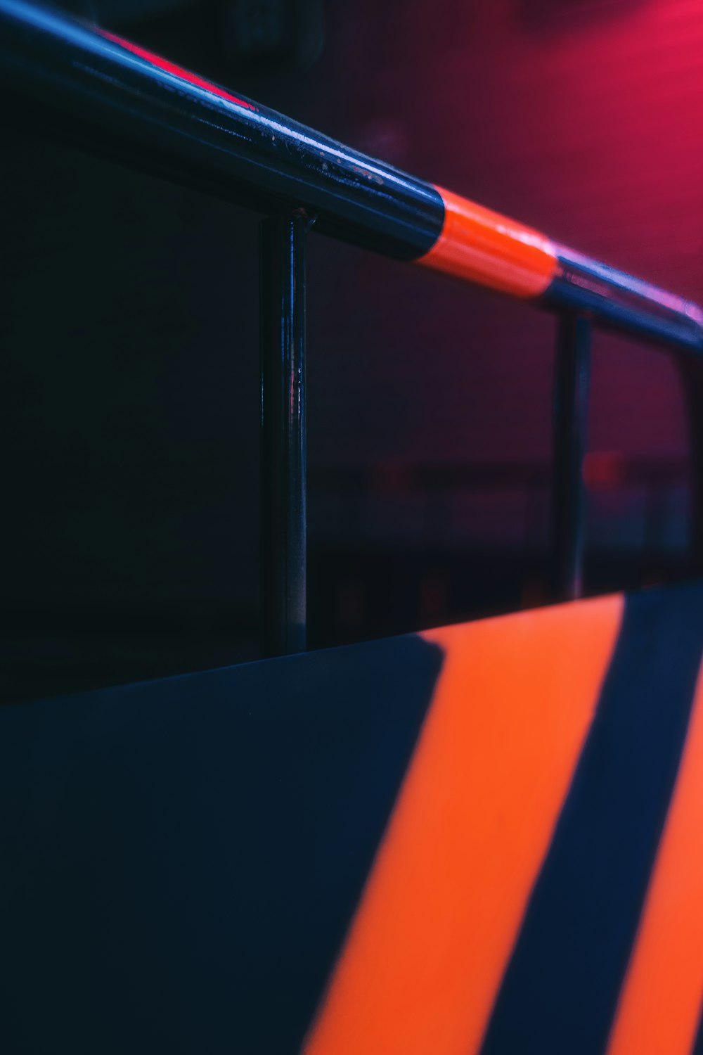 black and orange metal rail