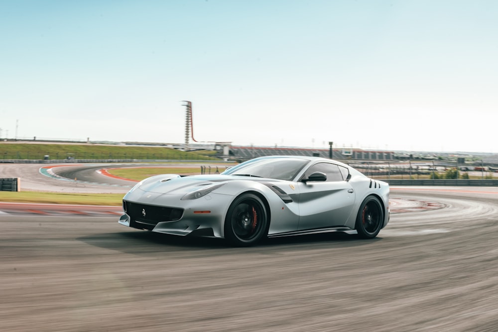 silver Maserati Granturismo on car