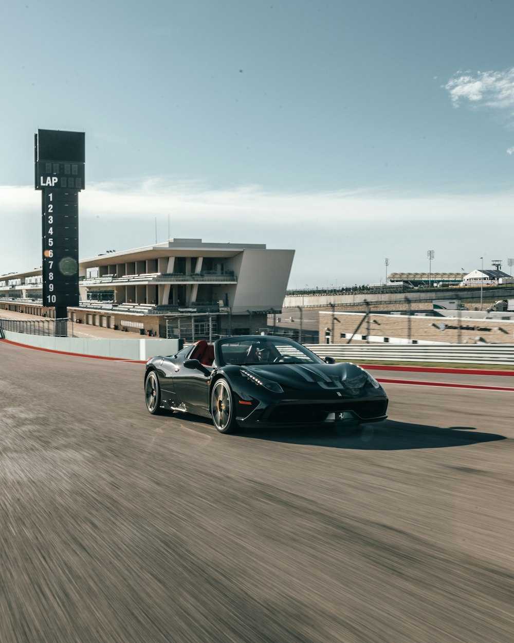 black coupe on road during daytime