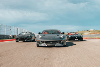 Preview of a sleek 3D racing game environment created in Unity, highlighting detailed cars and realistic tracks.