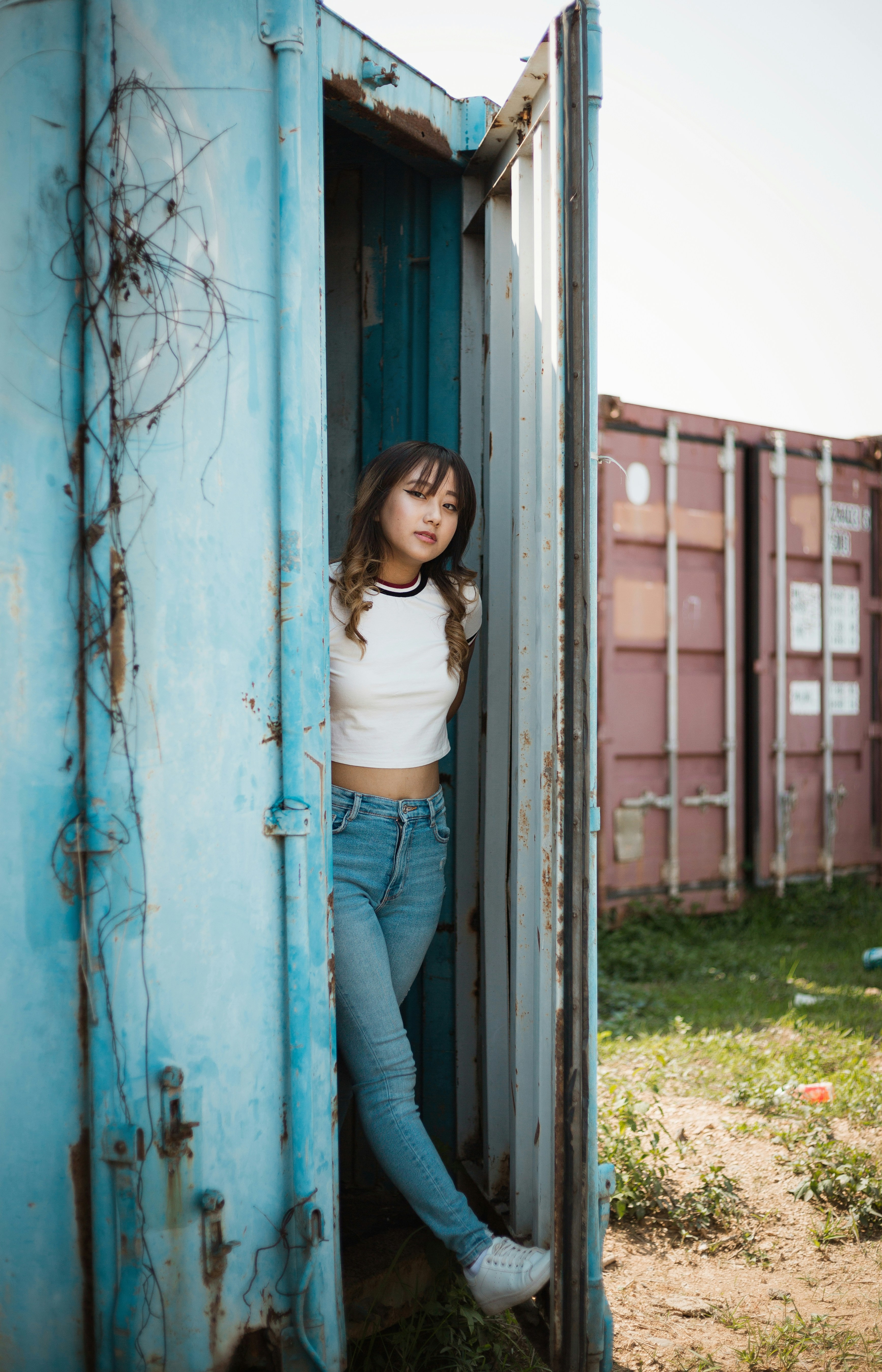 Woman in shipping container photo – Free Apparel Image on Unsplash