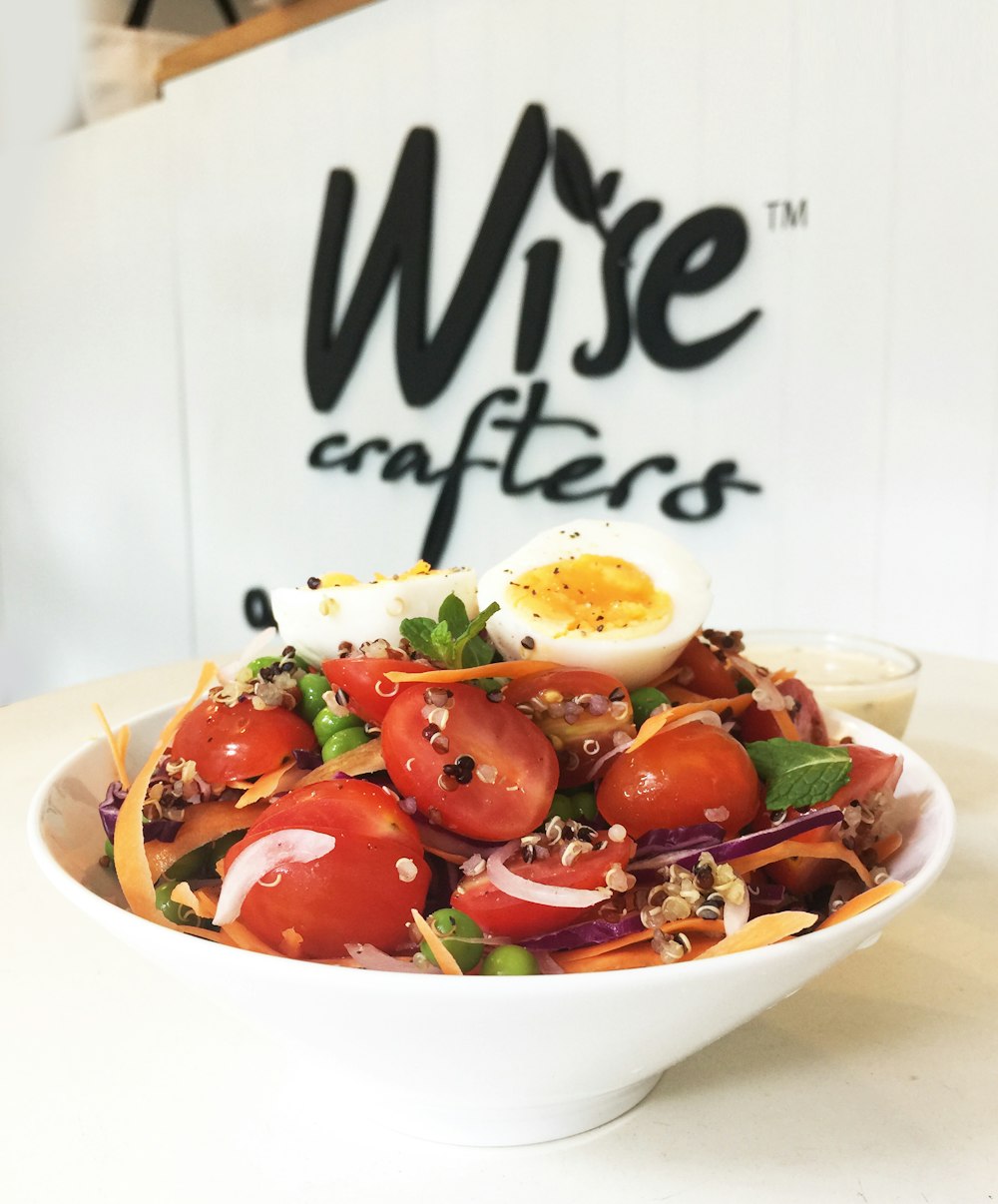 tomato salad in white bowl