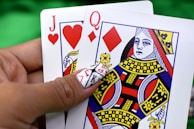 A close-up of a hand holding a winning bingo card.