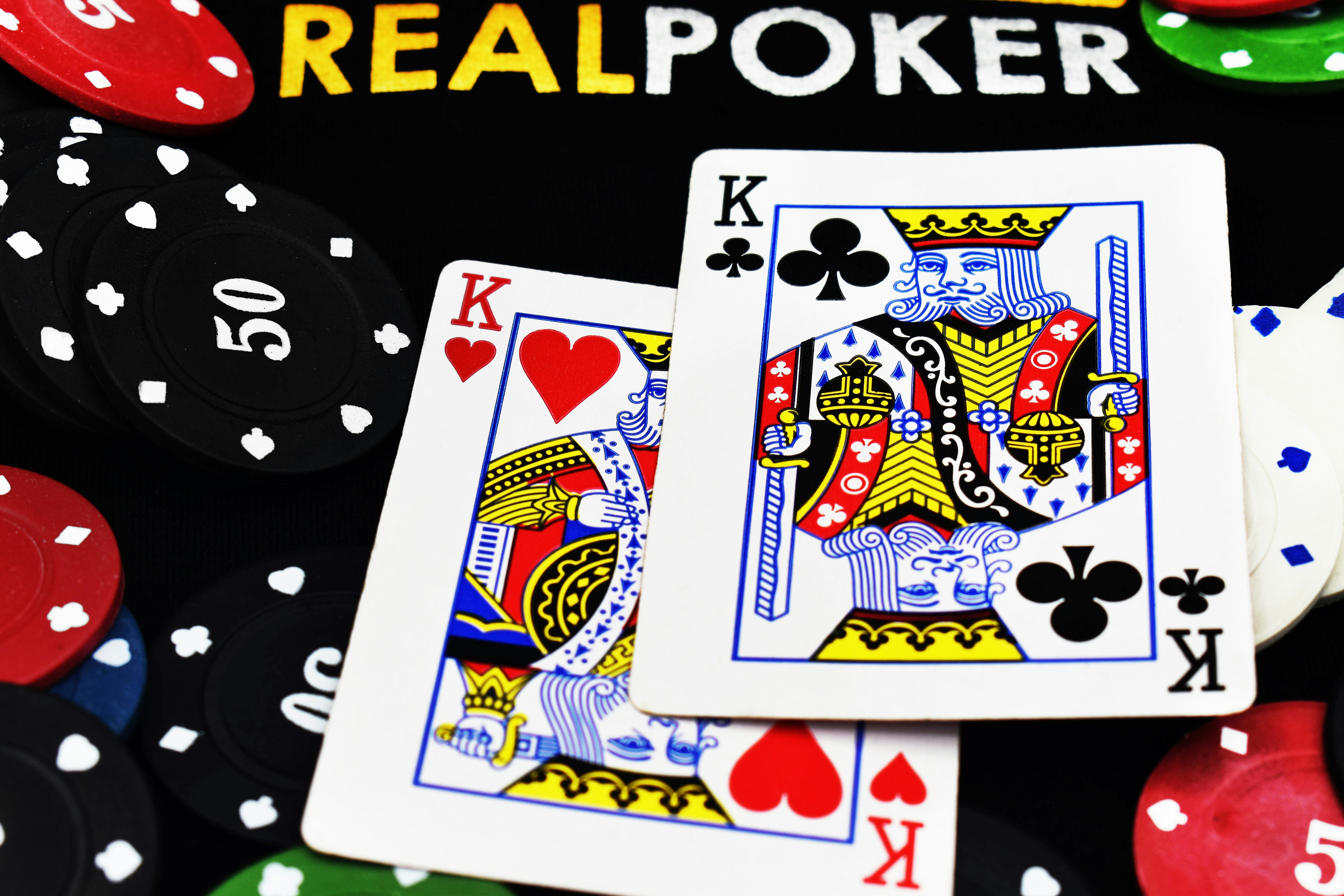 two King of club and heart on real poker