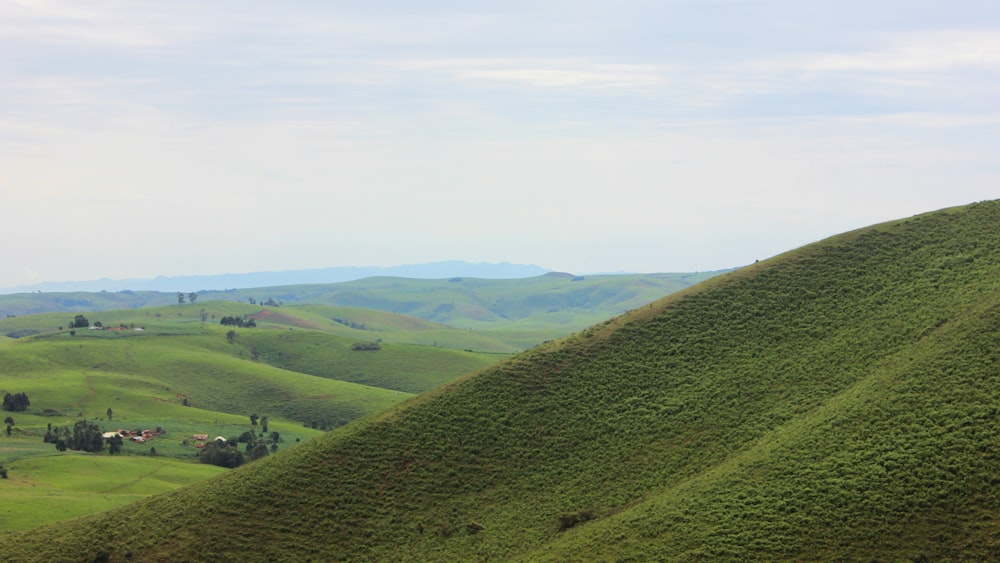 landscape photography of green mountain