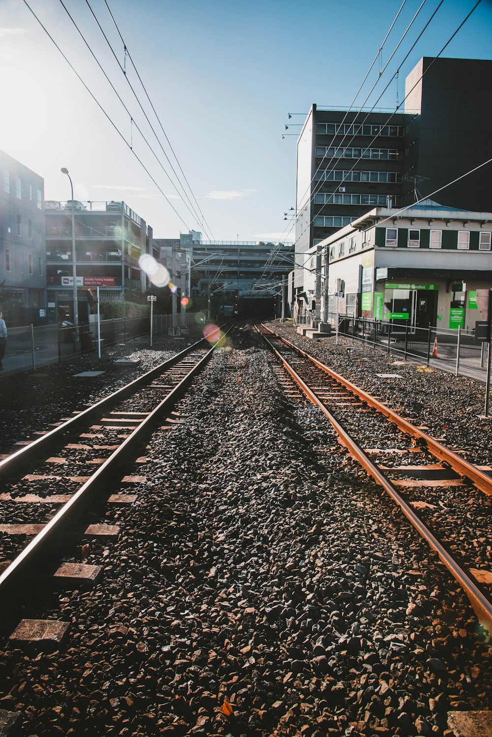 railroads under blue sky