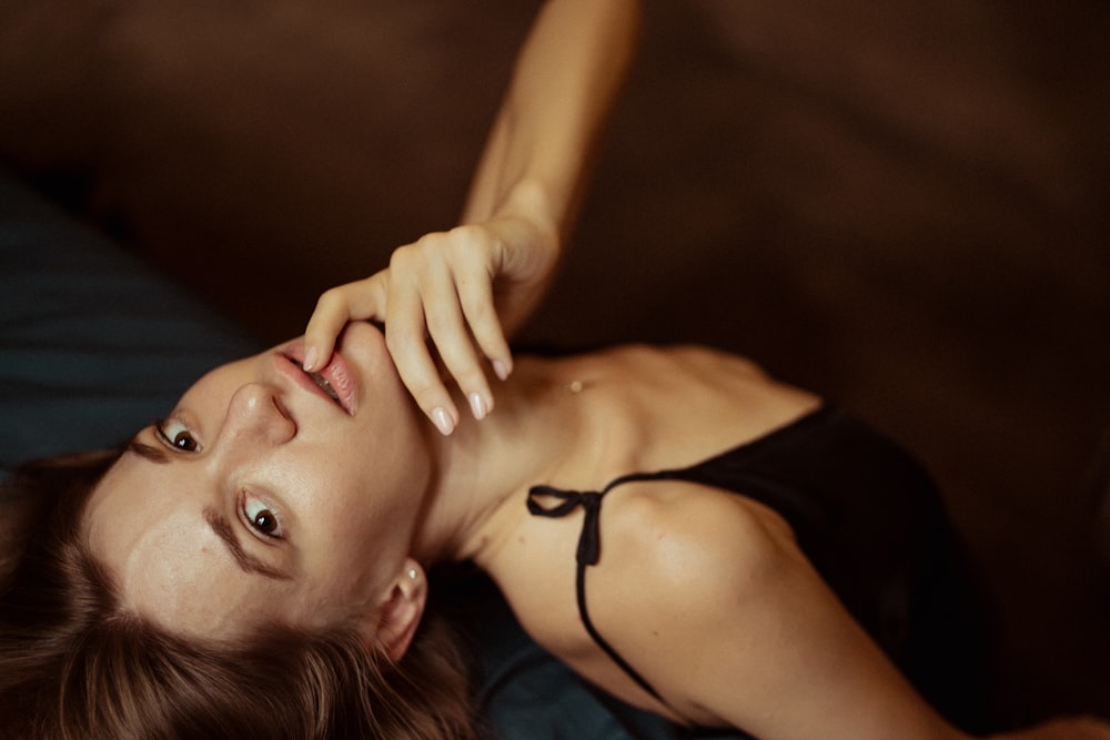 woman wearing spaghetti strap blouse