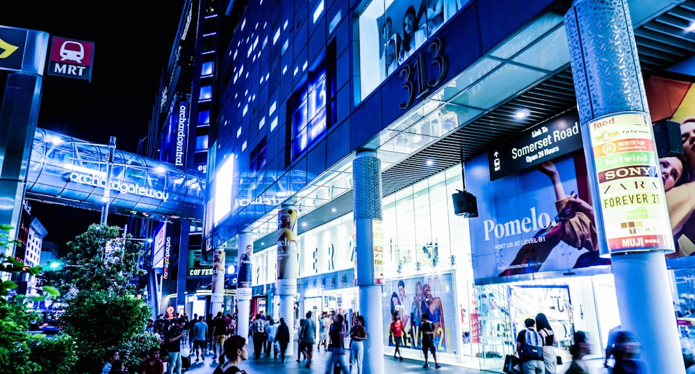 urban photo of a gray building at night