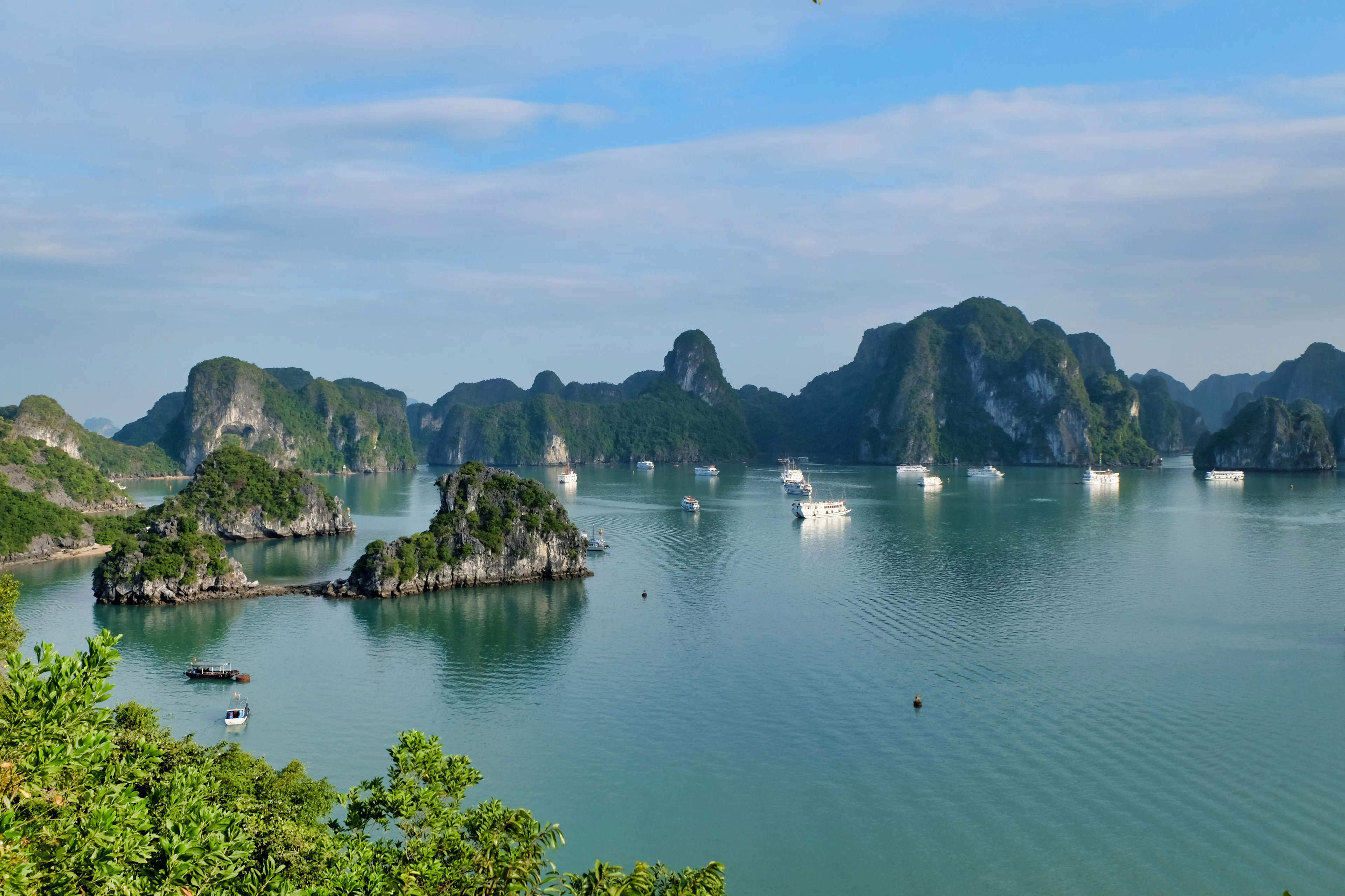 Calm water and limestone karsts in Ha Long Bay