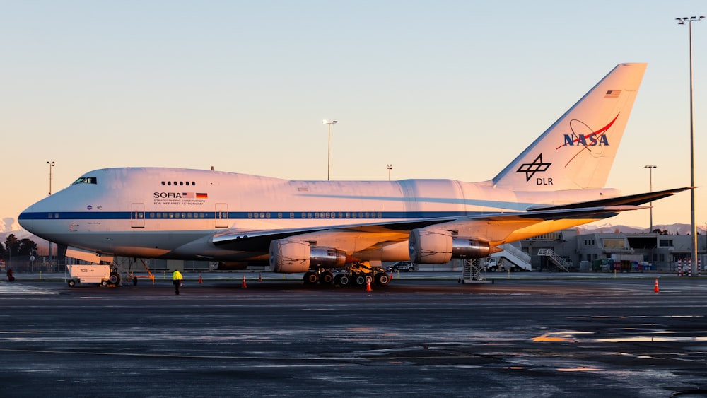 white NASA airbus on runway