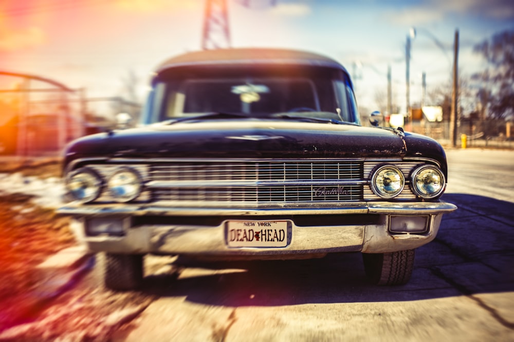 classic black car on the road