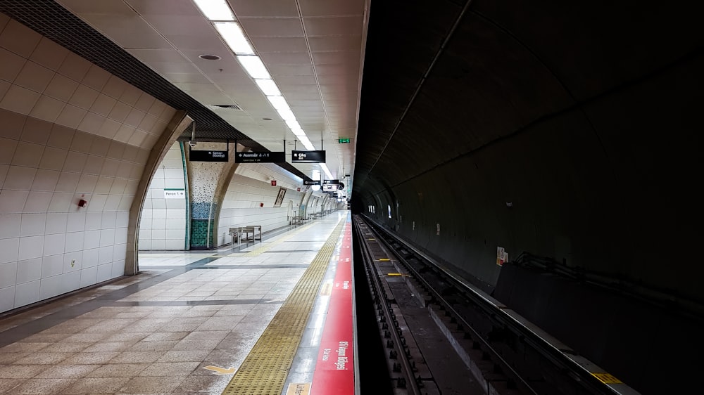 turned-on lights on train station