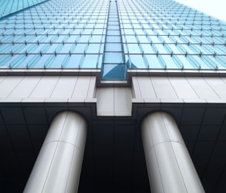 bottom view photography of curtain wall building