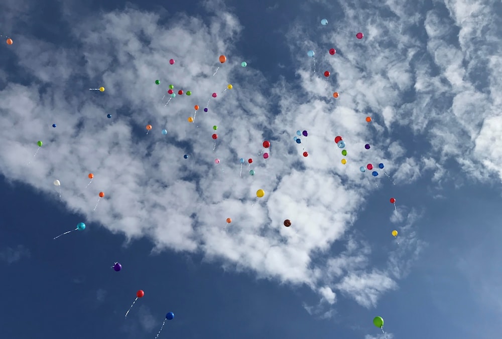 assorted balloons in the sky