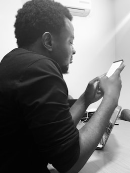 A local Oshawa HVAC technician reviewing leads on a smartphone.