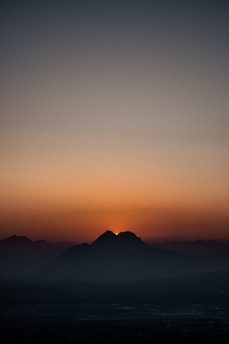 A serene sunrise over the Himalayas, radiating calm energy and awakening the mind.