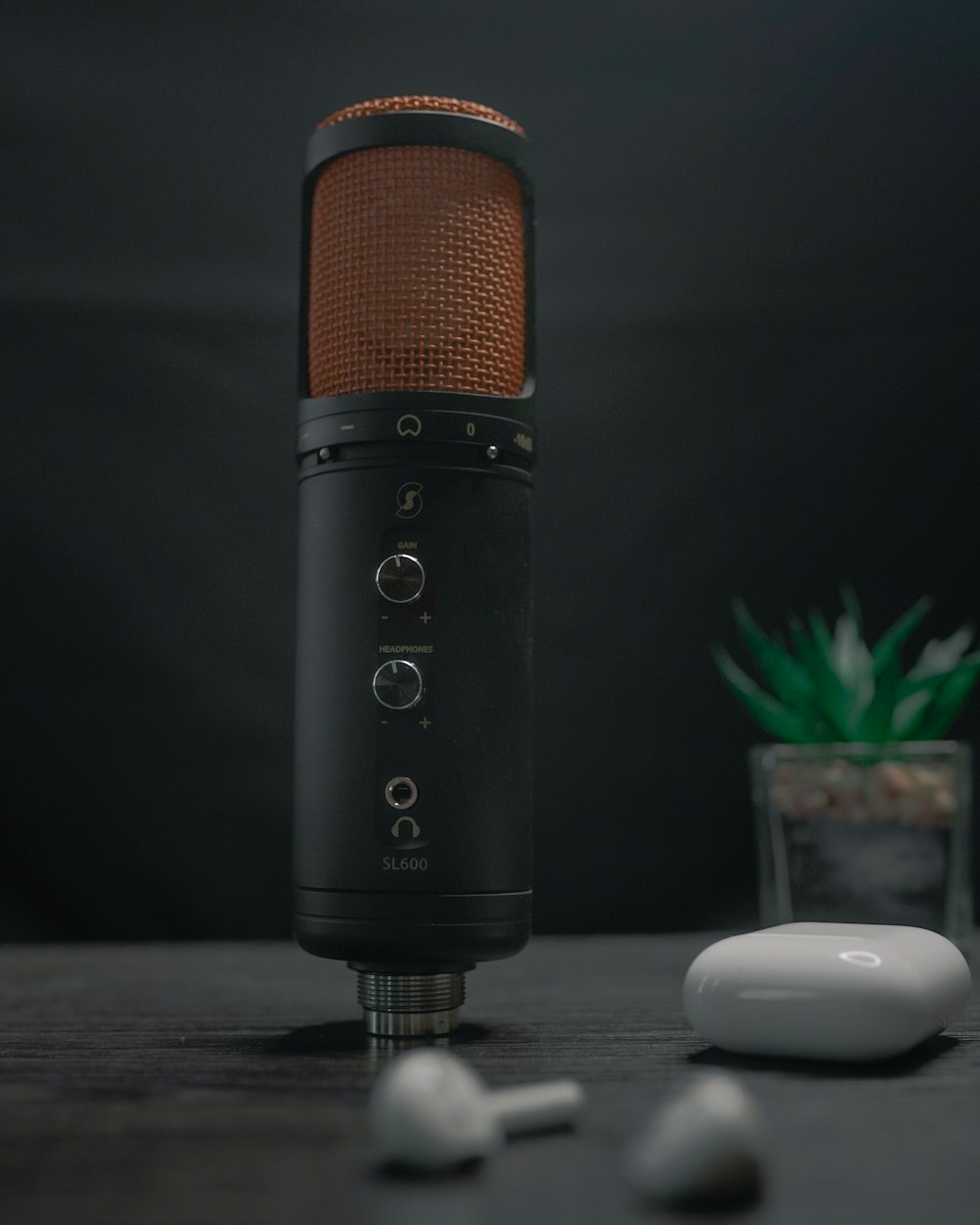 black and orange microphone on table