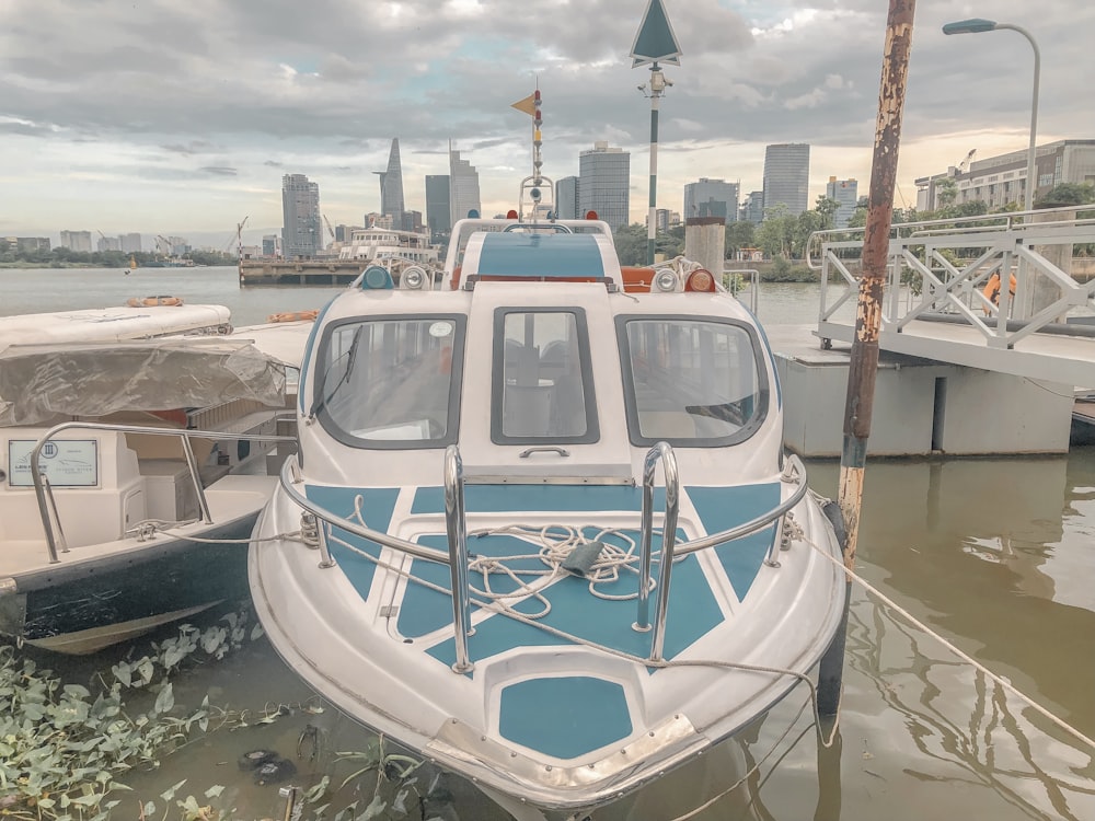 powerboat parked beside dock