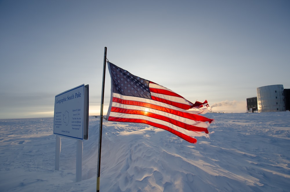 flag us USA beside white signage