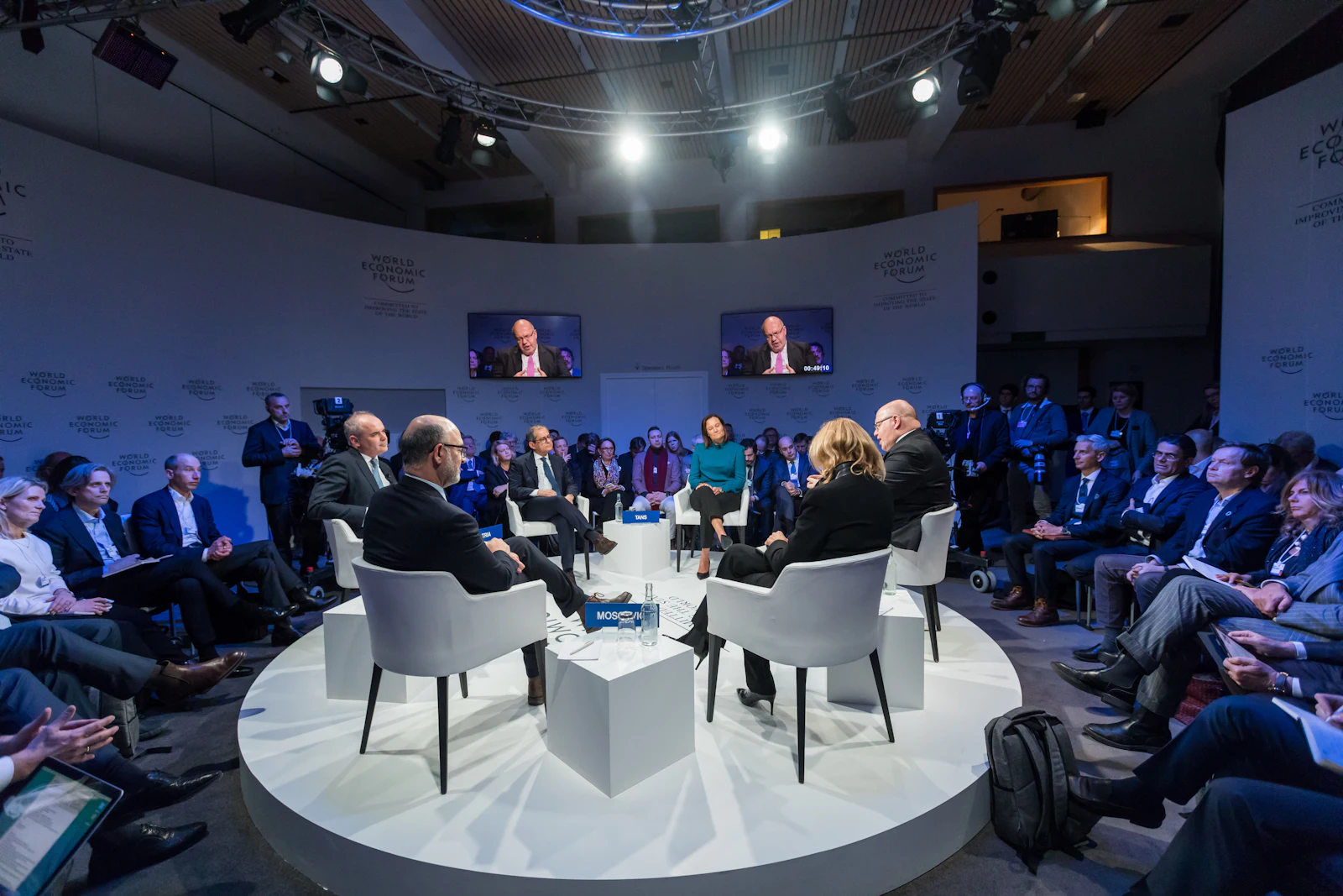 People seated at a conference session