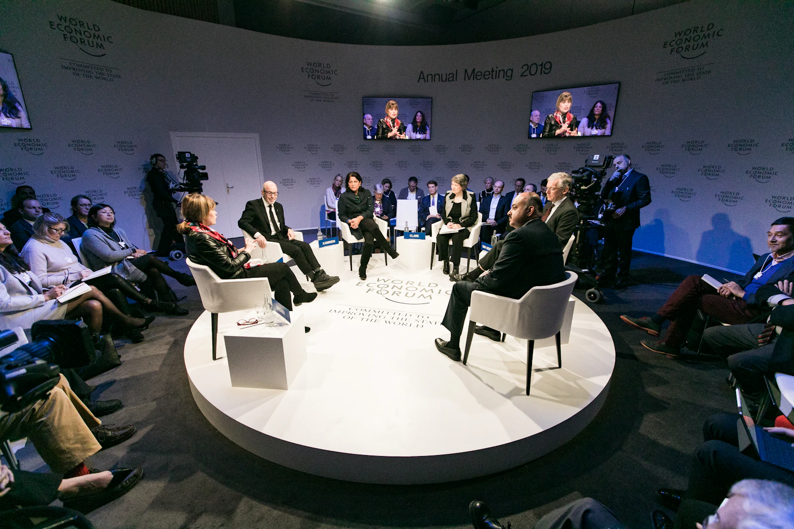 Branded stage at a company meeting, an example of brand identity in use