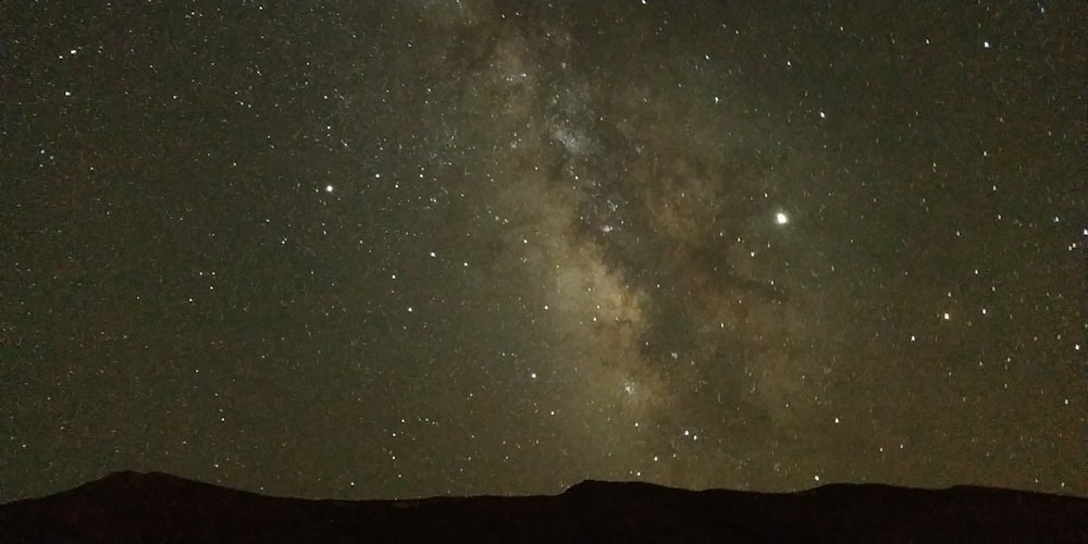 the Milky Way among starry night sky