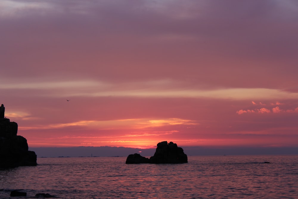 silhouette of an island at sunset