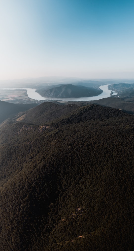 green hills and river in aerial photography in Dömös Hungary