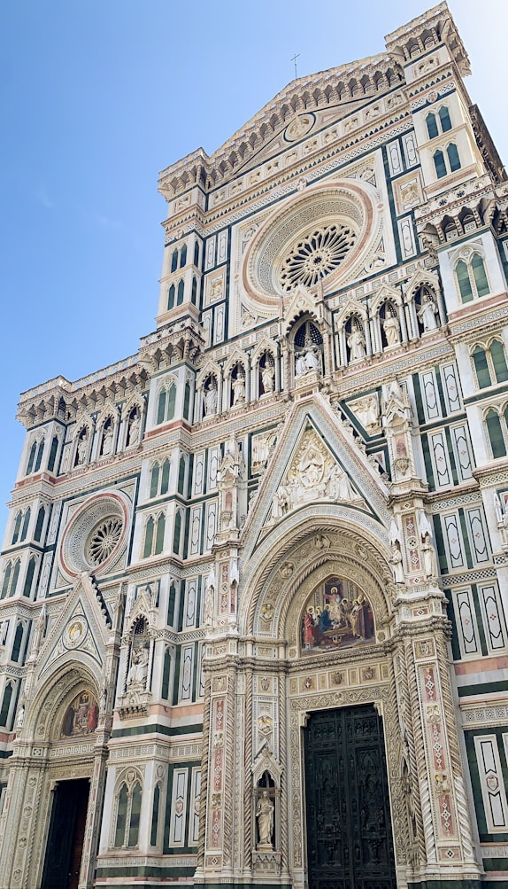 the front of a classical building in Florence, Italy