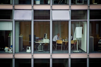 man sitting on chair inside room Brubaker Quality Control Management training Leadership Development