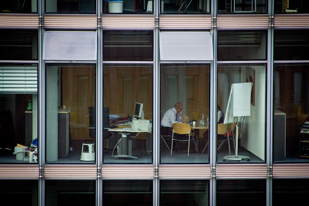 A business owner working alone late at night