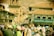 Colorful traditional Rajasthani market bustling with locals and tourists enjoying the culture.