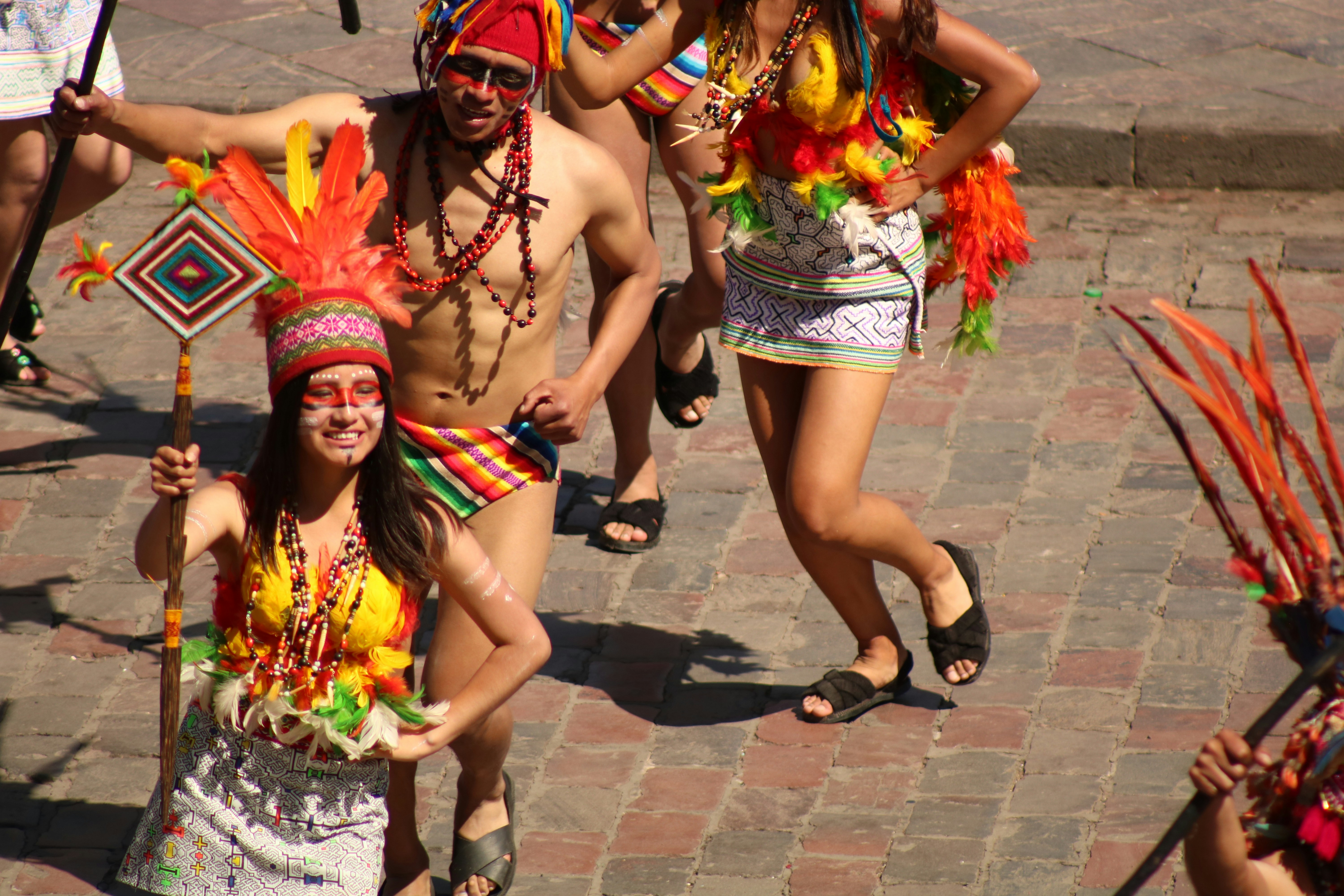 Vibrant carnival parade with colorful costumes and dancing performers in Brazil